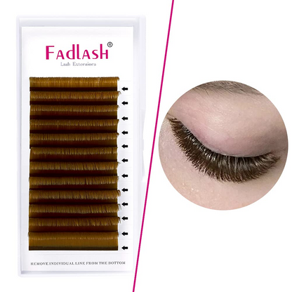 brown lash extension tray next to a model's eye showing natural applied results