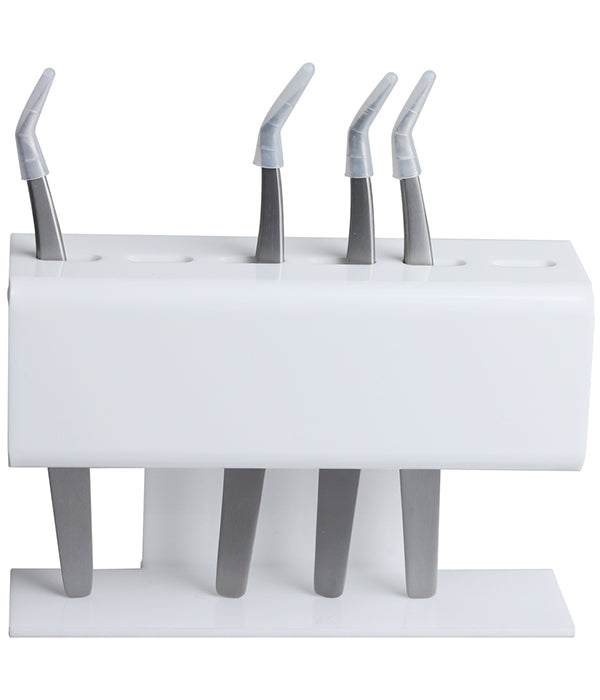Angled desktop tweezer stand organizing four lash tweezers