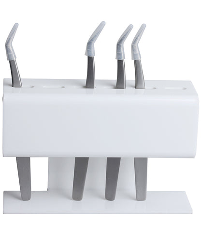 Angled desktop tweezer stand organizing four lash tweezers